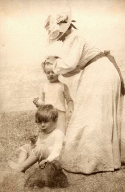 Sylvia Llewelyn Davies at the seaside with two of her sons [Image used by kind permission of the Chichester Partnership, Samuel French Ltd., London on behalf of the Estate  of J.M. Barrie, and Exeter University Library (Special Collections), copyright © 2003]