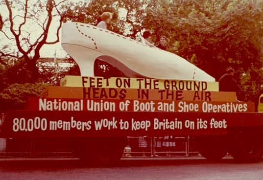 Feet on the ground, heads in the air. National Union of Boot and Shoe Operatives. 80,000 members work to keep Britain on its feet.